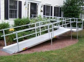 Modular ramp attached to a house